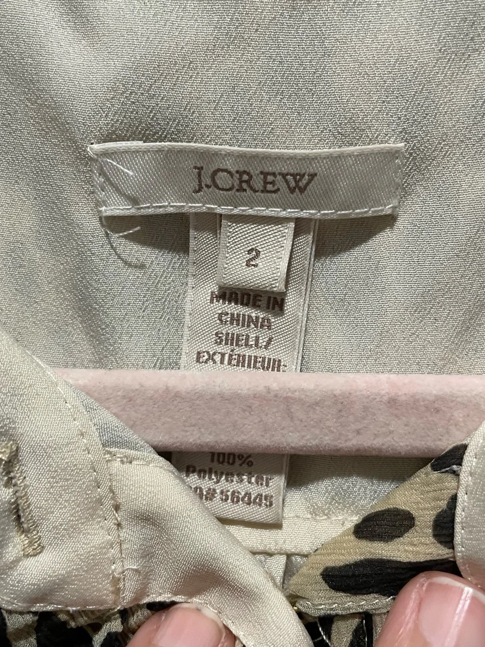 J.Crew silk blouse features a sleeveless design and a cheetah print. Size 2.